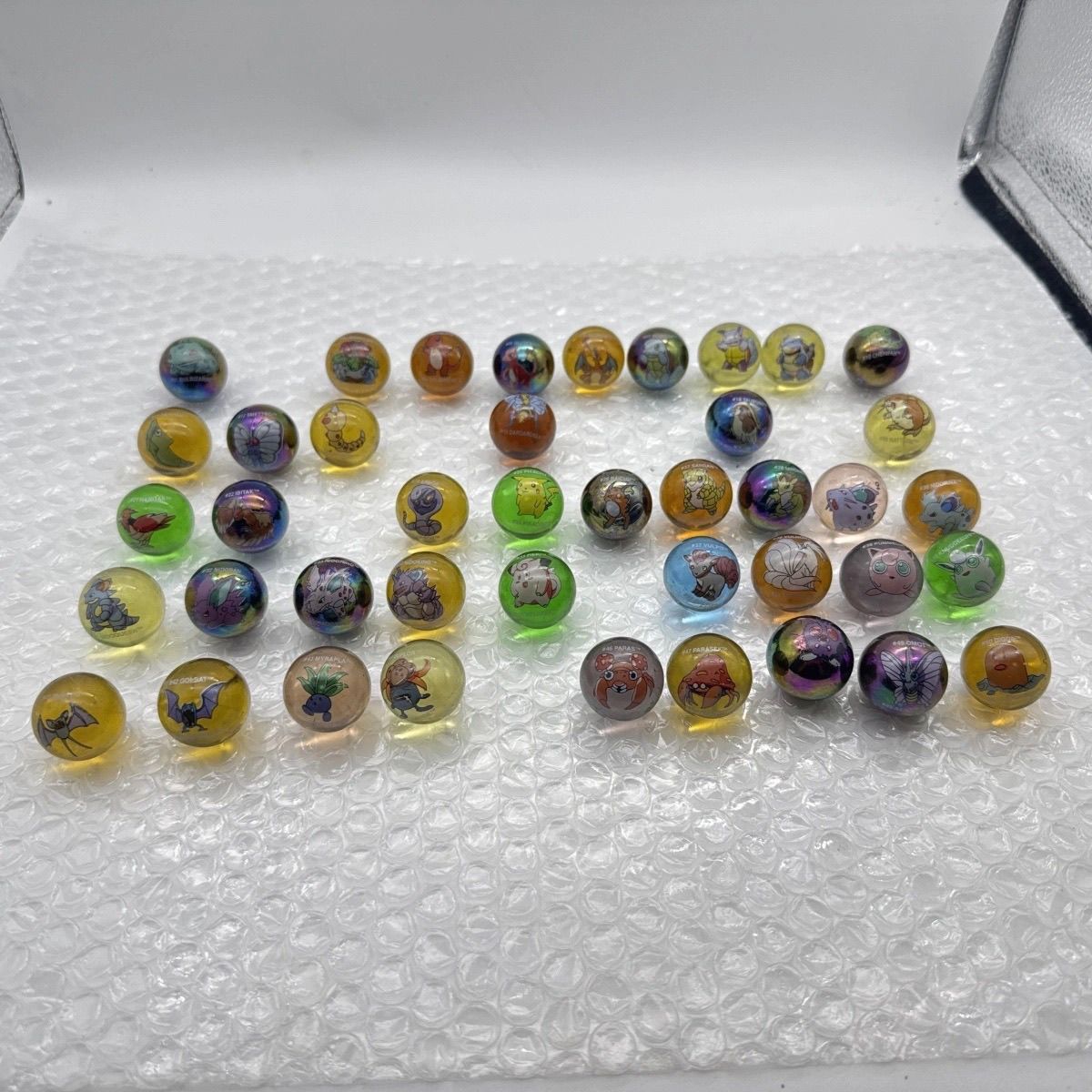 สินค้าโปเกมอนของแท้จำนวนมาก, ล - Vintage Collectible Marbles บทวิจารณ์และราคา